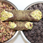 Chocolate Covered Pistachio Cannoli offers a delicious take on the classic Italian cannoli. This delectable treat is made with a rich chocolate shell, creamy pistachio, ricotta filling, and crunchy bits of the nut on the ends, giving you a burst of flavour in every bite. These cannoli are decadent enough to serve at a fancy dinner party or to enjoy whenever you need something to satisfy your sweet tooth.