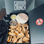 After an avalanche of requests, Cannoli Crunch has designed a beautiful and scrumptious Cannoli Chips and Dip.  This new addition to our SetBox Collection is always available and a perfect choice to share on any occasion!  Included in the SetBox are:  Cannoli pastry shells broken into dipping sizes, a container of chocolate AND the original filling (225g), a ramekin of pistachio bits, and a ramekin of chocolate pearls!