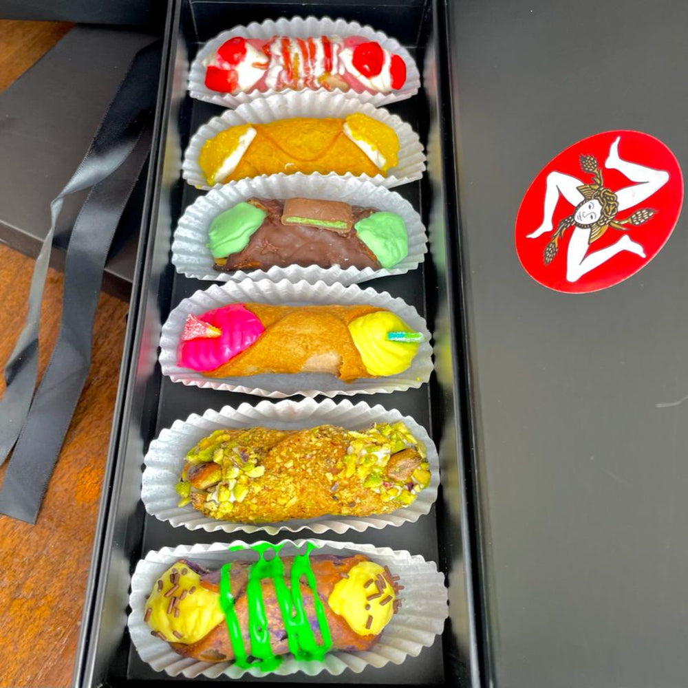 June's SetBox of 6 delightful and delicious cannoli showcases Chef Maria's creativity and our dedication to tantalizing your senses.  Bursting with colour and sensational flavours, these cannoli will wow you morsel by morsel.  Included in June's SetBox of 6 are:  Top to bottom:  The Ruby Strawberry, The Dragon's Eye, The CocoMint Arrow, Love is Love, TrePistacchio, and The Passionate Fruit.  #seeyousoon