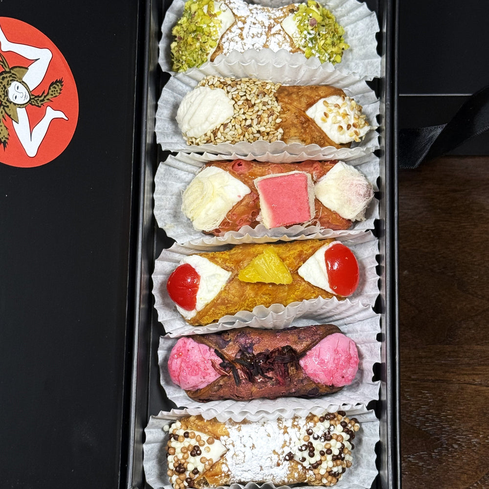  Included in the SetBox are:&nbsp;


Top to bottom:&nbsp; Traditional Pistachio, The Honeyed Sesame, The Pink Angel Hair Chocolate,
The Upside Down Pineapple, The Hibiscus, and the Traditional Chocolate.