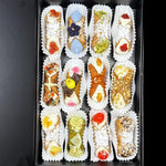 Included in the SetBox of 12 are:

Top Row:&nbsp; Signature Mango/Beetroot Jelly, The Blue Matcha, Traditional Pistachio, Signature Fieldberry Cannoli,

Middle Row:&nbsp; The Hot Cross Bun, The Easter Egg Basket, The Persimmon, The Maple Walnut,

Bottom Row:&nbsp; Signature Ginger/Rhubarb Jelly, The Coconut Lime, Traditional Cherry, and Traditional Chocolate.

Enjoy a breath of Spring Air and a taste of freshly piped, fusion cannoli!