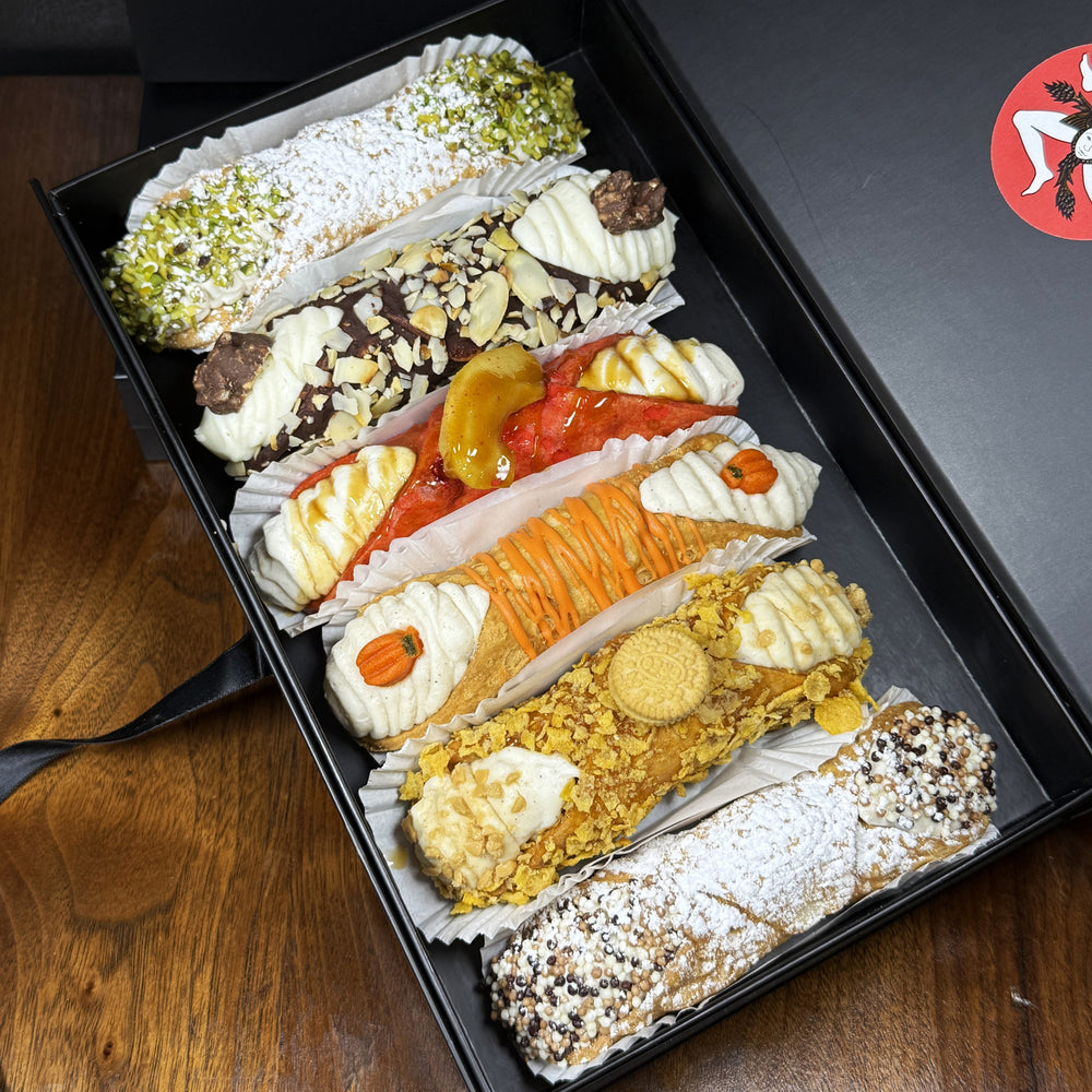 Take a delicious bite and savour the playful essence of Fall with every mouthful—because the best memories are made with sweet, unforgettable tastes! Included in the SetBox of 6 Small Gourmet Cannoli are:

Top to bottom:&nbsp; Traditional Pistachio, The Chocolate Almond Cluster, The Candy Apple, The Pumpkin Spice, The Golden Oreo, and Traditional Chocolate!

Ready for your Thanksgiving spread!