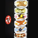 Included in the SetBox are:&nbsp;


Top to bottom:&nbsp; The Maple Pecan, The Coconut Lime, The Easter Egg Basket, The Persimmon, The Blue Matcha, and The Hot Cross Bun Cannoli!