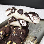 Elegance in every bite!&nbsp; Elevate your dessert experience with our Tuxedo Cannoli, a sophisticated twist on the classic Italian treat. This luxurious cannolo combines the richness of dark chocolate and the creaminess of white chocolate, creating a divine blend of flavours that is as visually stunning as it is delicious.&nbsp; Chocolate dust graces the ends and a chunk of Tuxedo cookie adorns the top!&nbsp; This is truly a masterpiece of art and decadence!&nbsp; Buon appetito tutti!