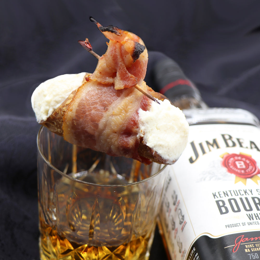 To all our bacon lovers! Sit back and enjoy this deep fried crispy crunchy cannoli!  We have wrapped our cannoli shell with bacon, and seasoned our creamy, smooth ricotta with herbs and spices and bourbon!  Bang!! Here you have a savoury cannoli with a southern USA twist. Cheese, bacon, and bourbon... a combo for all to enjoy!