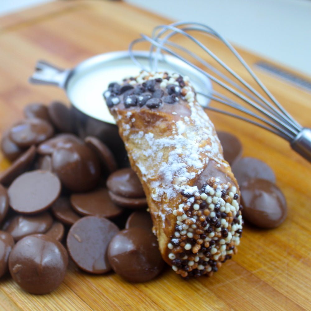 Do you love Belgian chocolate?  We have fashioned our crispy-crunchy, deep-fried, homemade cannoli shells with rich smooth Belgian chocolate gelato. The chocolate continues to the ends of these cannoli as they're dipped in a medley of white, dark, and milk chocolate pearls! It's a thrill for all chocolate lovers!    www.cannolicrunch.ca                                                   
