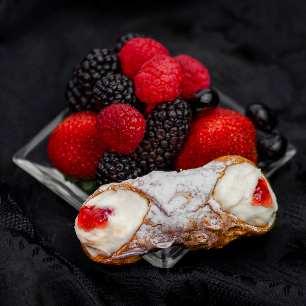 Take a walk in the forest and behold you can find a full assortment of berries in the fields. We have created a New Signature Jelly cannoli filled with the fresh taste of raspberries, strawberries, blueberries, and blackberries in the centre of our creamy, smooth ricotta. This sweet and tangy combination is piped into our crispy, crunchy shell and sprinkled with icing sugar!  It's a favourite!