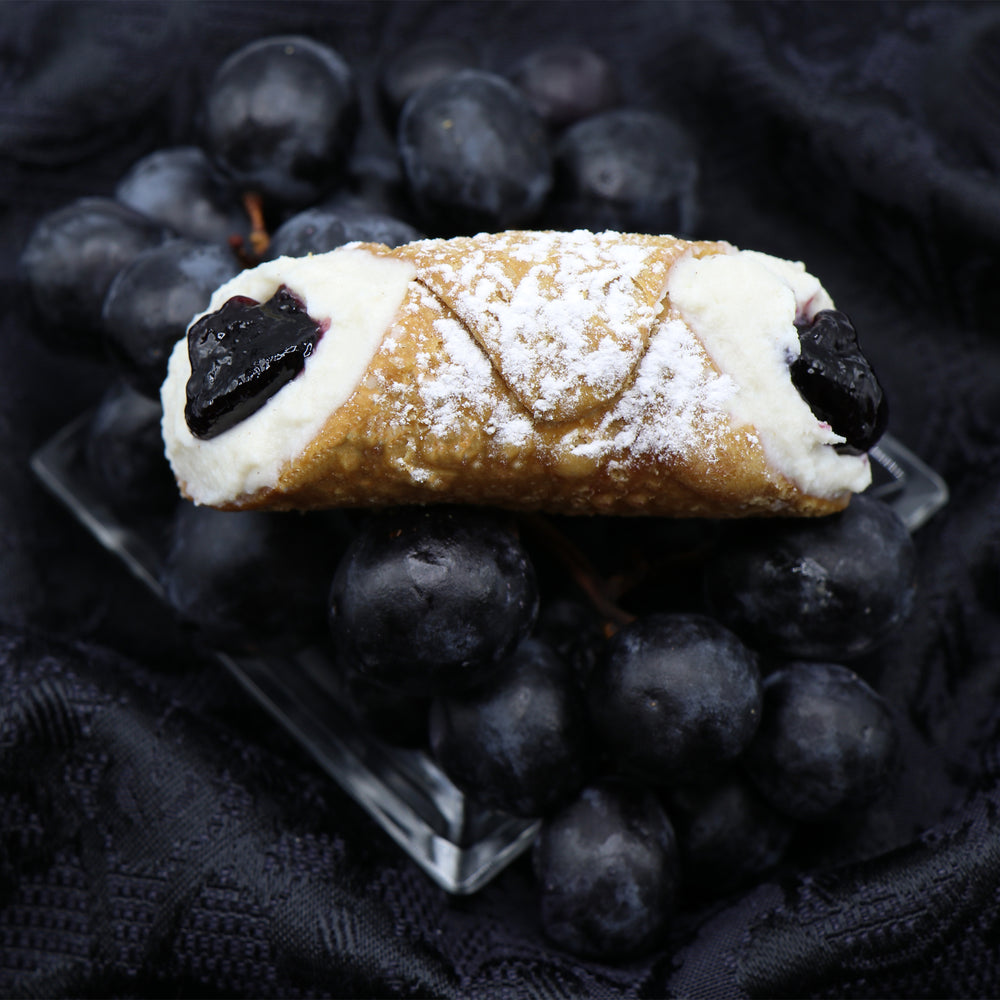 The vineyards of Sicily beckon you.  Here at Cannoli Crunch, we have piped grape jelly into the centre of our fresh, smooth, ricotta cheese filling.  Surrounded by our cripsy-crunchy pastry shells, these cannoli make a taste sensation that is tangy and sweet...  buon appetito!