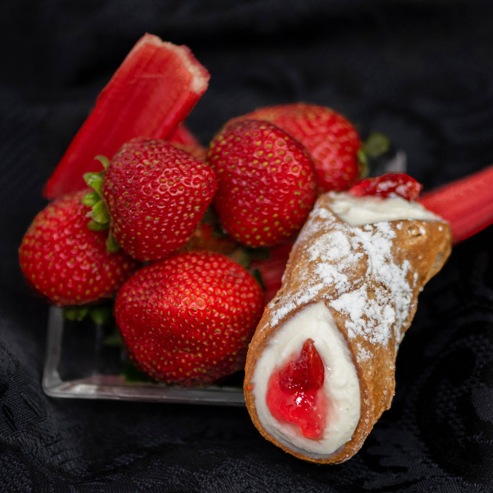 Sweet strawberries and tangy rhubarb is a perfect combination that has a dear place in pie lovers' palates.  Well... Cannoli Crunch has created a strawberry rhubarb jelly-filled cannoli with housemade jam piped in the centre of our smooth, creamy ricotta and then surrounded with our crispy, crunchy pastry shell.  Move over pies... cannoli is the new game in town!
*AVAILABLE WITH DAIRY-FREE CREAM FILLING!
www.cannolicrunch.ca